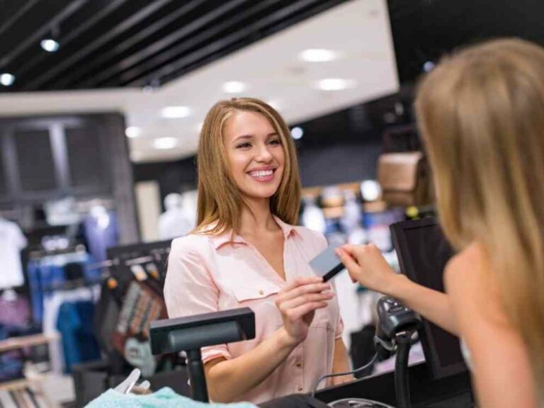 Woman paying with credit card