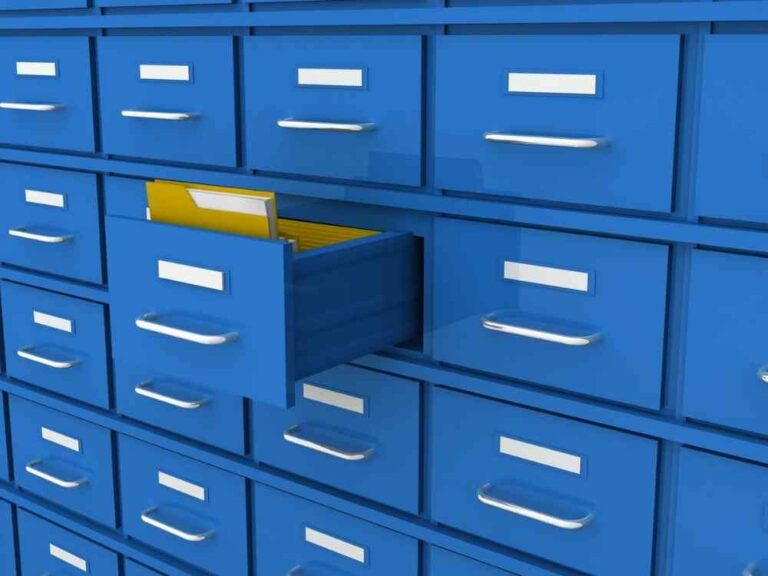 Blue filing cabinet with one drawer open